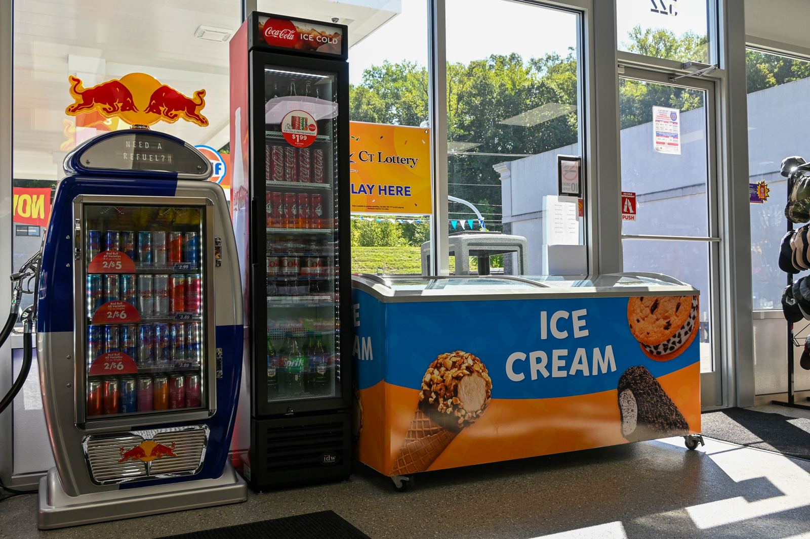 Ice cream, Red Bull cooler and CT Lottery